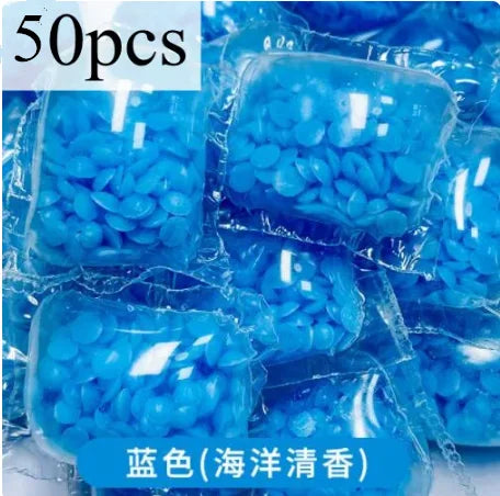 50 pieces of light blue laundry fragrance beads packaged in clear plastic.