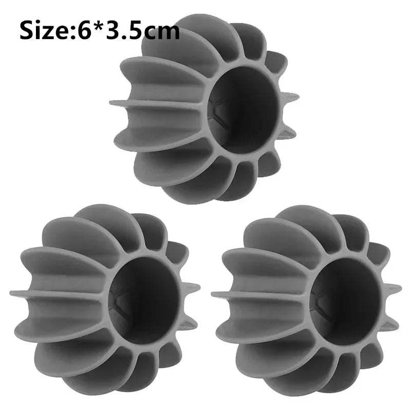 Gray reusable laundry ball designed for pet hair and lint removal