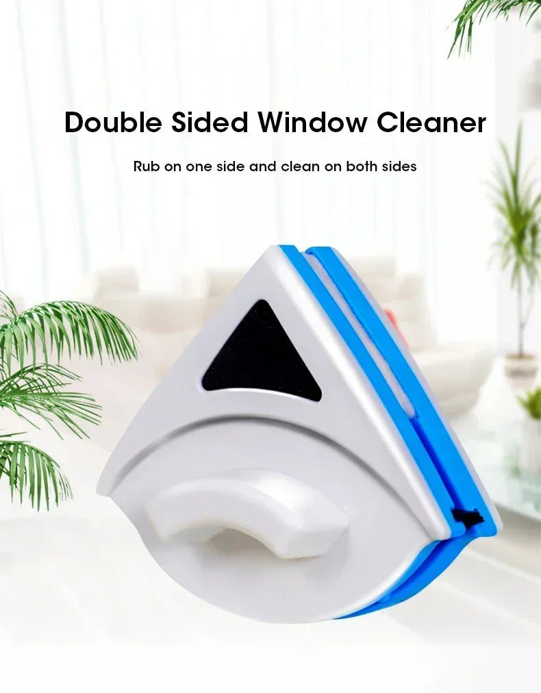 A white and blue double-sided window cleaner device is shown on a white surface.