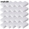 A set of thirty small white melamine cleaning sponges or magic erasers.