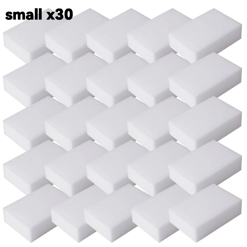 A set of thirty small white melamine cleaning sponges or magic erasers.