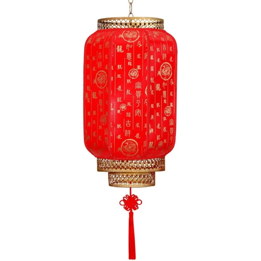 A durable antiqued red Chinese lantern with intricate details and a decorative tassel.