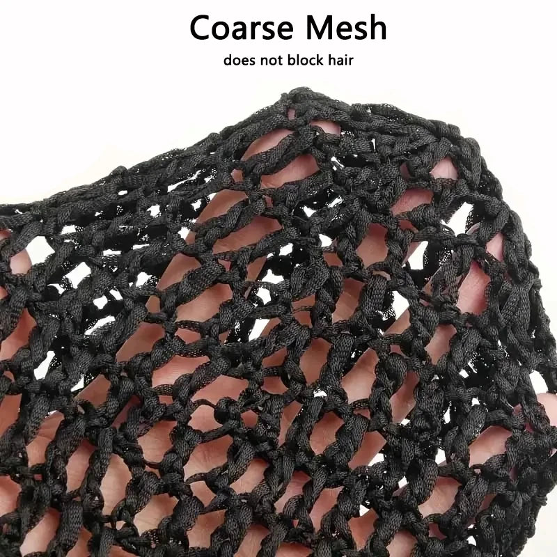Close-up of a black coarse mesh wig cap being worn on a person's head.