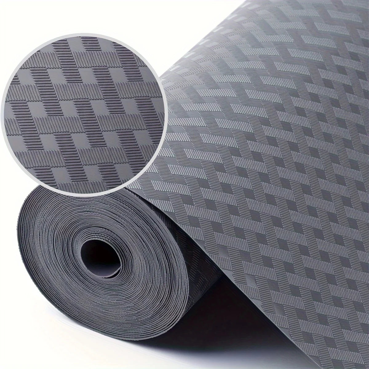 Roll of gray patterned reusable shelf liner material with a circular swatch showing the texture
