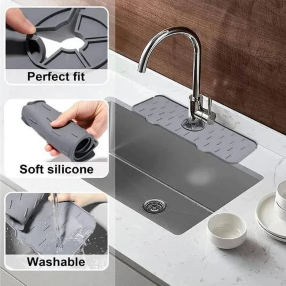 A kitchen faucet with a silicone drainer and splash guard mat installed on a sink.