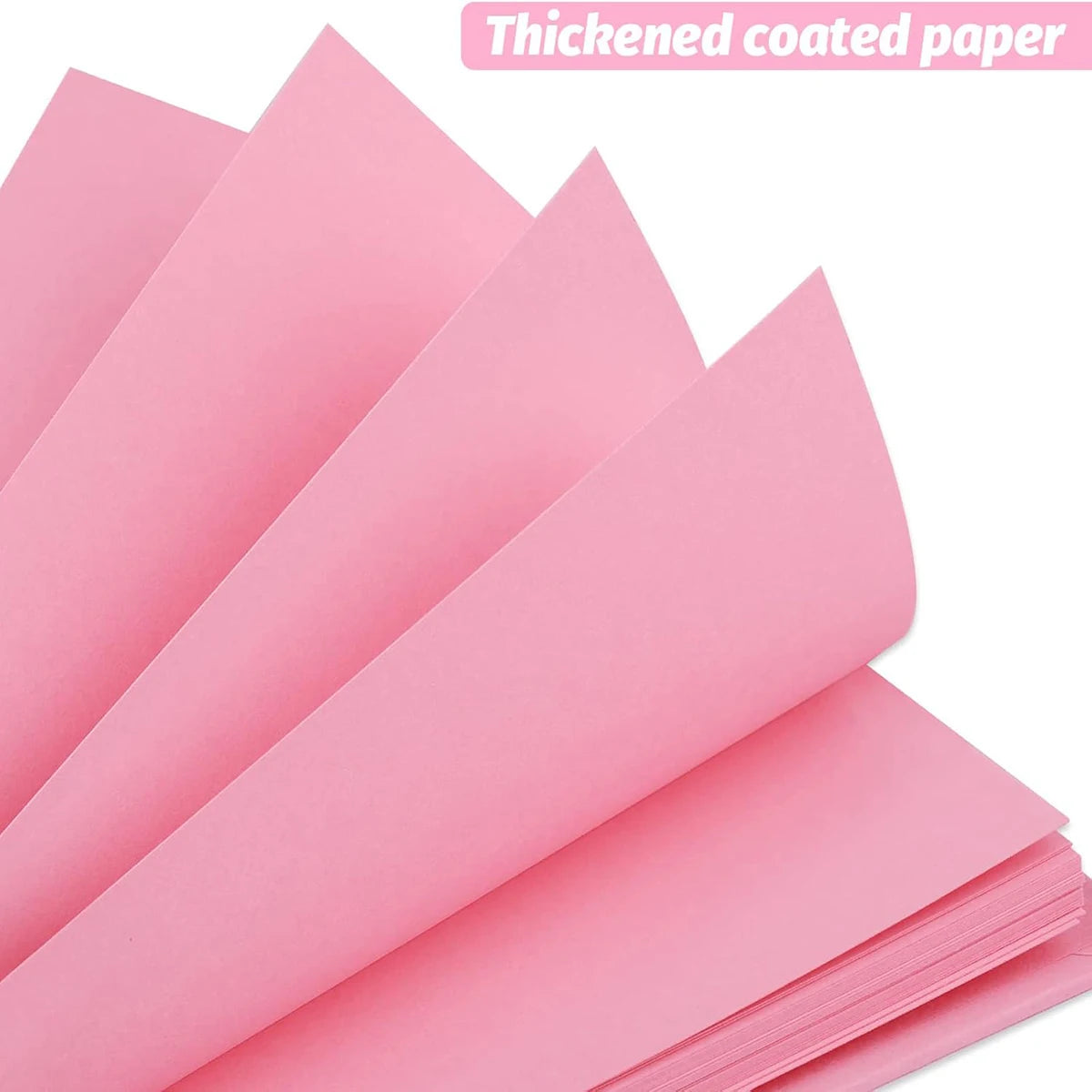 Hojas de papel cubiertas y engrosadas de color rosa apiladas y extendidas para manualidades