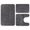 A set of three gray memory foam bathroom rugs, including a rectangular mat and two irregular shapes.