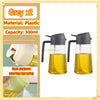 Two grey plastic oil spray bottles with yellow liquid inside, demonstrating dual-purpose pouring and spraying.