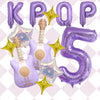 A set of purple balloons shaped like letters and numbers, including the word 'KPOP' and the number 5, accented with golden st