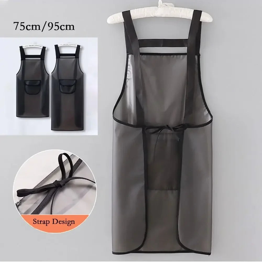 A black waterproof transparent kitchen apron hanging on a hanger, showing the strap design.