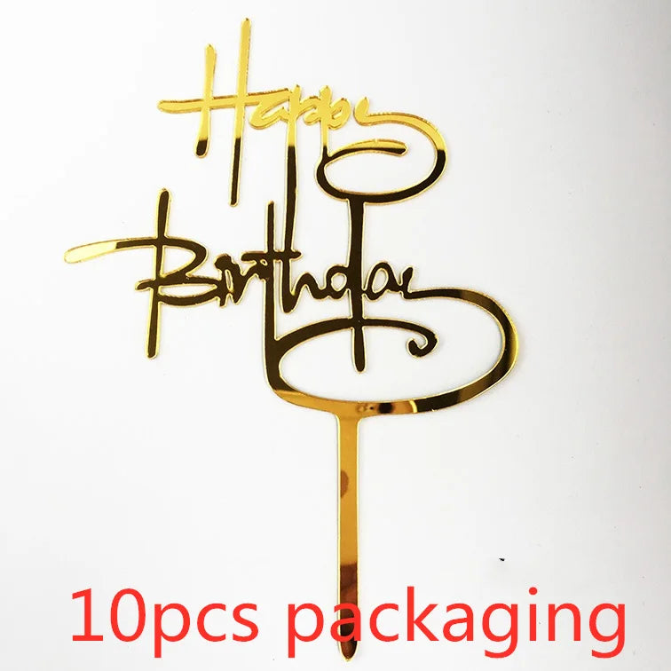 Gold acrylic birthday cake toppers featuring the words Happy Birthday