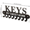Black decorative metal key holder rack with hooks featuring the text KEYS MY SWEET HOME