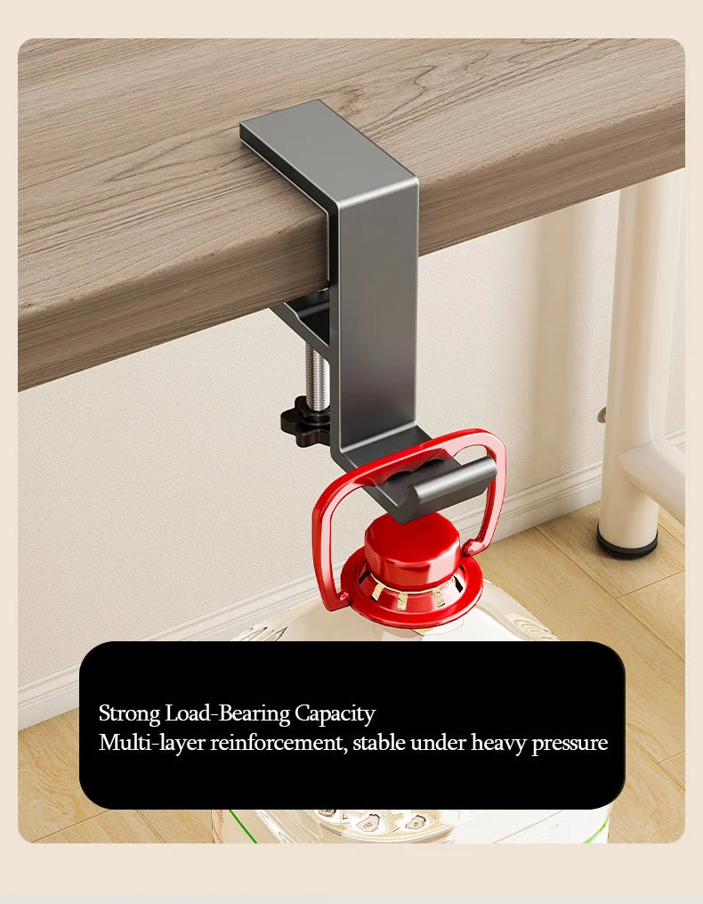 A close-up view of a silver aluminum desk hanging hook with a red grip, designed for strong load-bearing capacity.