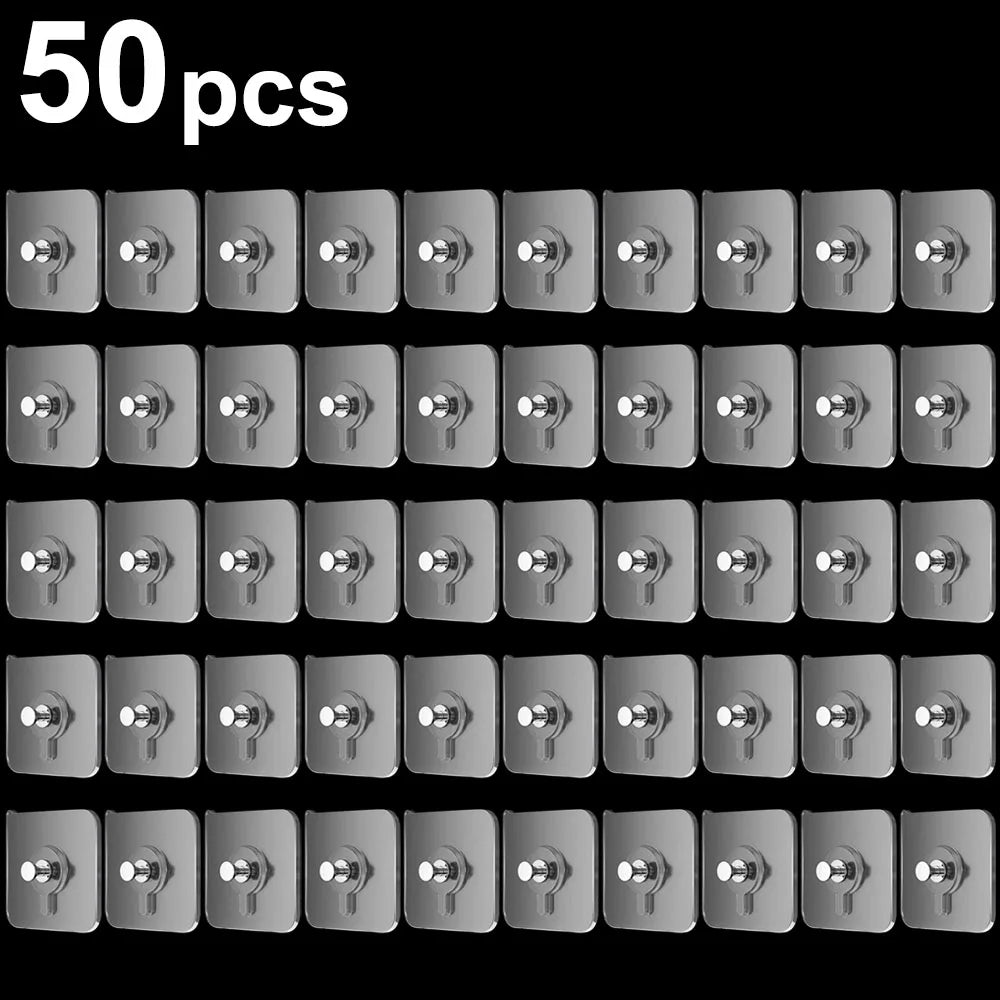 A set of 50 transparent self-adhesive wall hooks for hanging frames and photos.