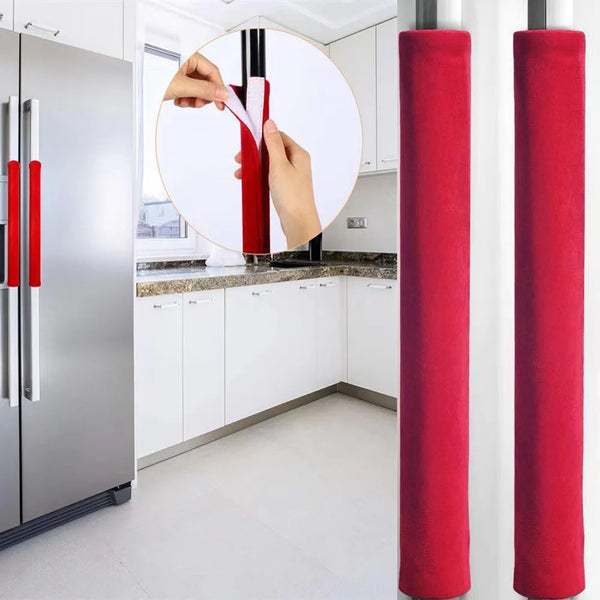 Two red door handle covers are shown against a white refrigerator and next to a white cabinet.