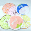 A collection of reusable fruit shower caps in various colors and designs featuring sliced fruits like watermelon, lime, and c