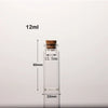 Flacon en verre transparent avec bouchon en liège, étiqueté 12ml et mesurant 60mm de hauteur.