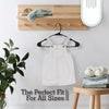A set of eco-friendly plastic clothes hangers is displayed on a wooden shelf.