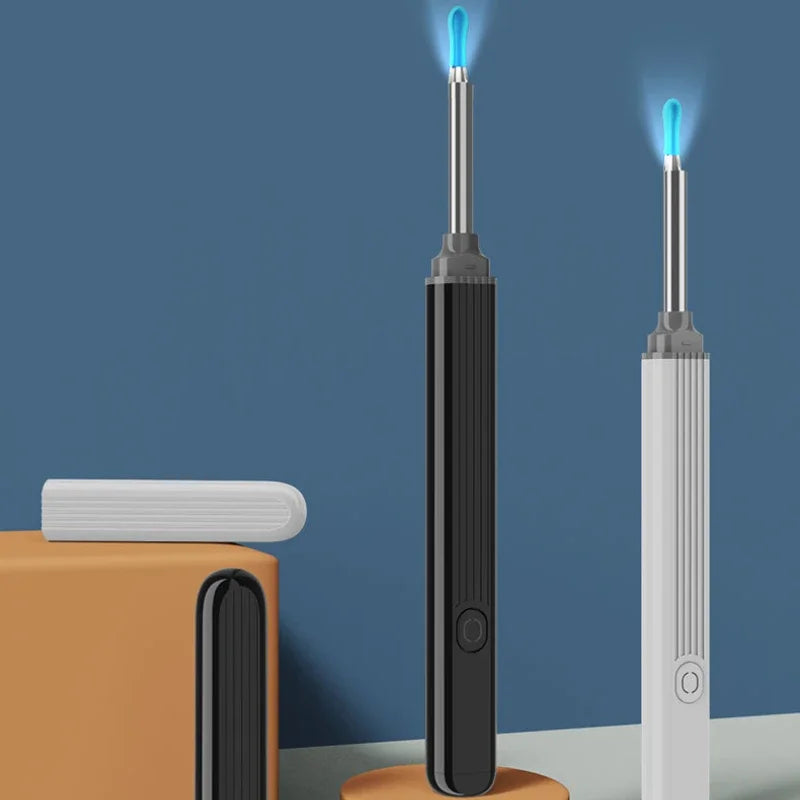 A vertical view of a black and white visual ear cleaning tool with an LED light emitting from the tip.