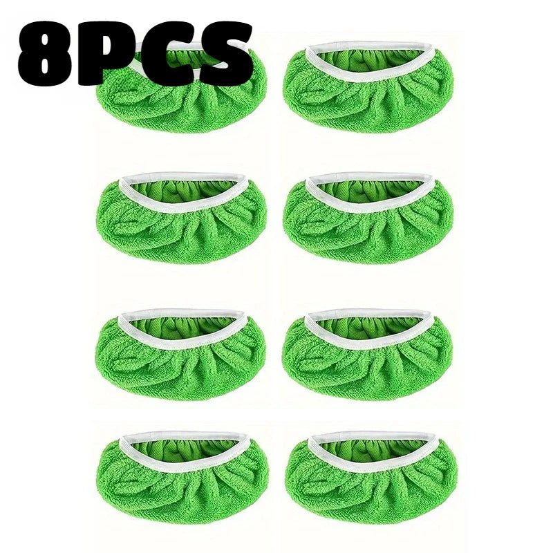 Eight reusable green microfiber mop replacement cloths shown in various folded and open configurations.