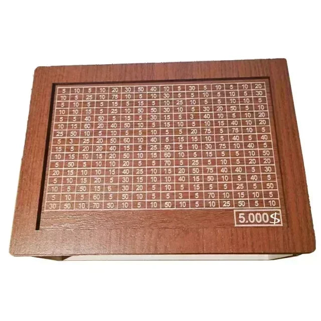 A wooden piggy bank with various saving goal amounts marked on its surface.