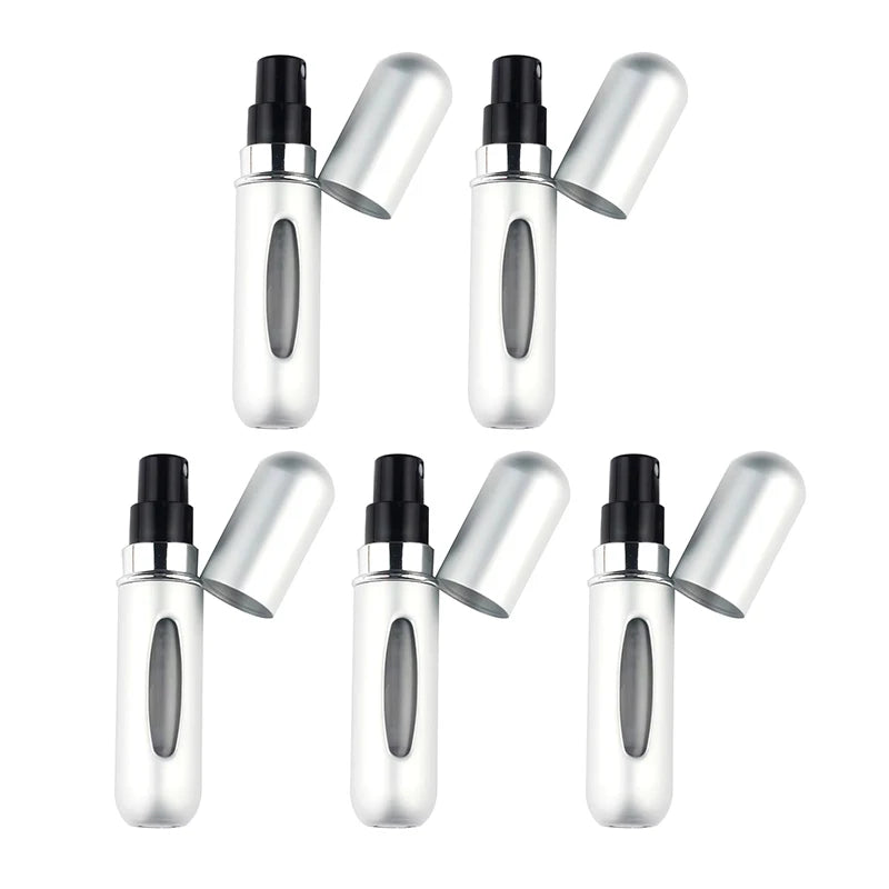 A set of five silver portable refillable perfume spray bottles shown in various angles.
