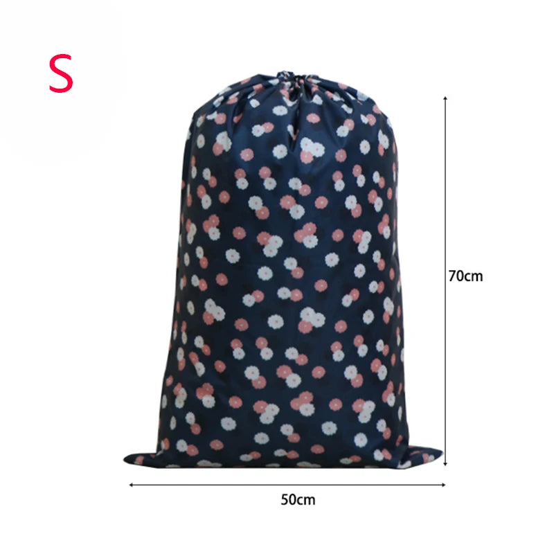 A dark blue drawstring storage bag with a floral pattern, shown vertically.