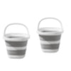 A pair of striped collapsible water buckets with handles for portable storage.