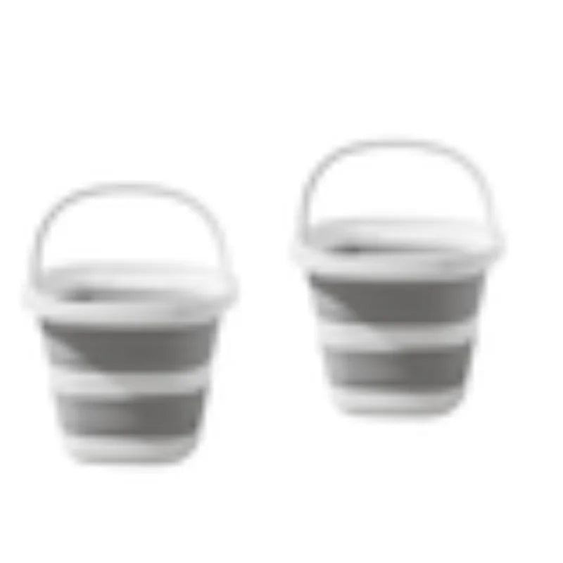 A pair of striped collapsible water buckets with handles for portable storage.