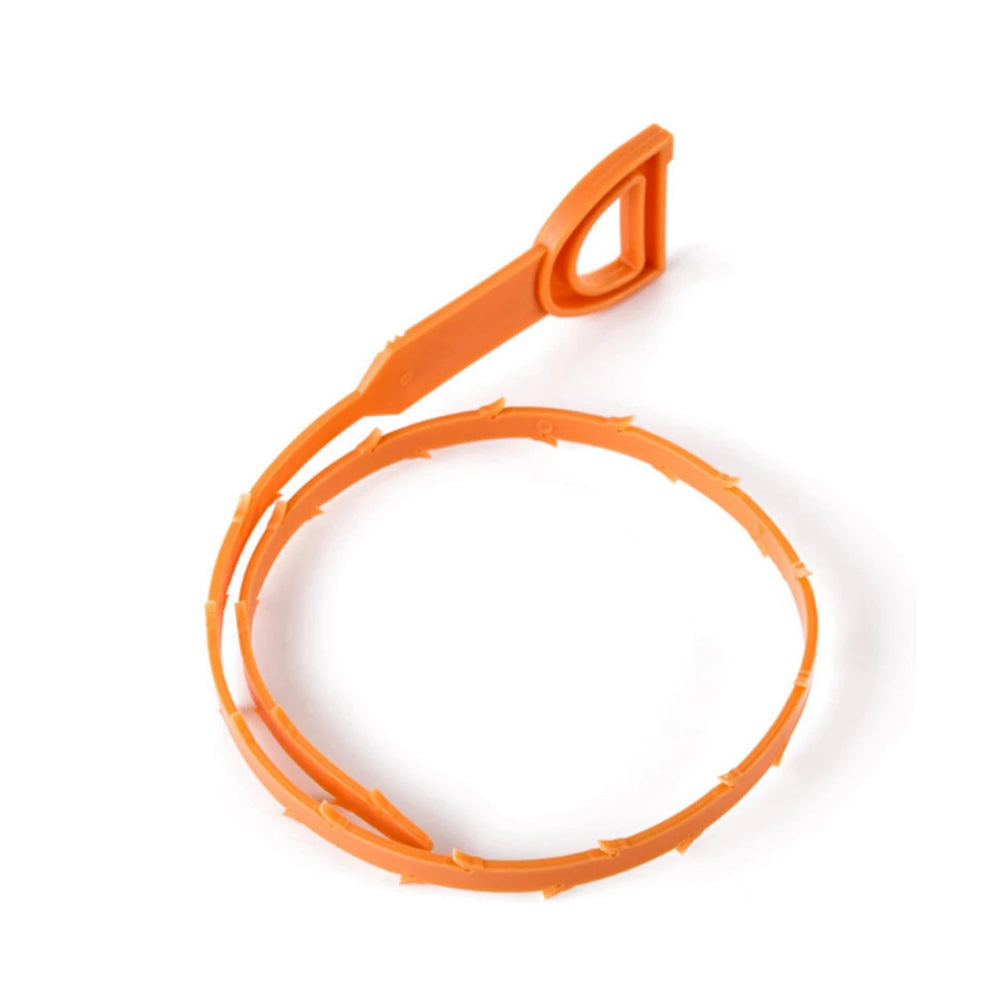 Orange flexible drain cleaning brush with a handle for clearing sinks and pipes