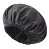 A black reusable satin lined shower cap shown from above.