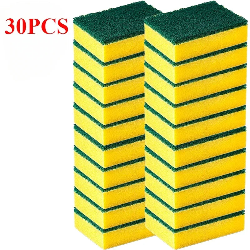 A stack of thirty reusable double-sided kitchen cleaning sponges, yellow and green.