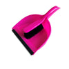 A bright pink mini handheld dustpan and brush set for cleaning desks and keyboards.