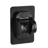 Pommeau de douche noir fixé au mur avec fonction multi-mode.