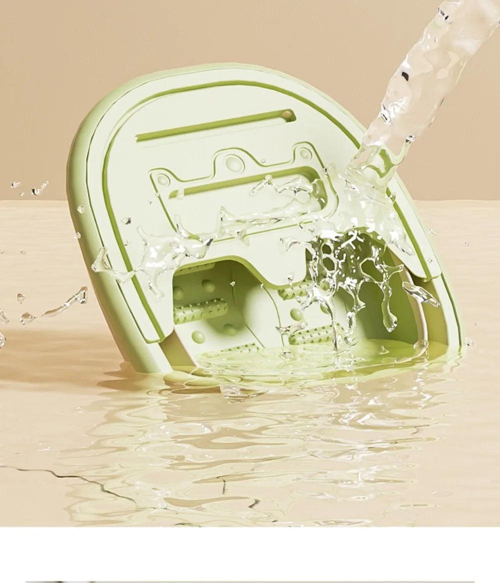A light green portable foldable foot bath tub is being filled with water from a dispenser.