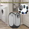 Foldable mesh laundry basket organizer with multiple compartments shown next to a washing machine.