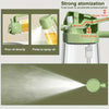 A green oil spray bottle demonstrating dual function for direct pouring and pressurized spraying.