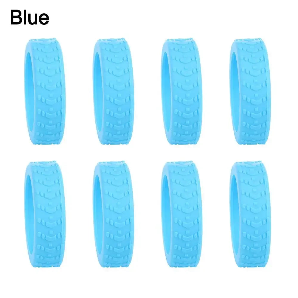 Eight blue silicone luggage wheel protectors for protection and grip.