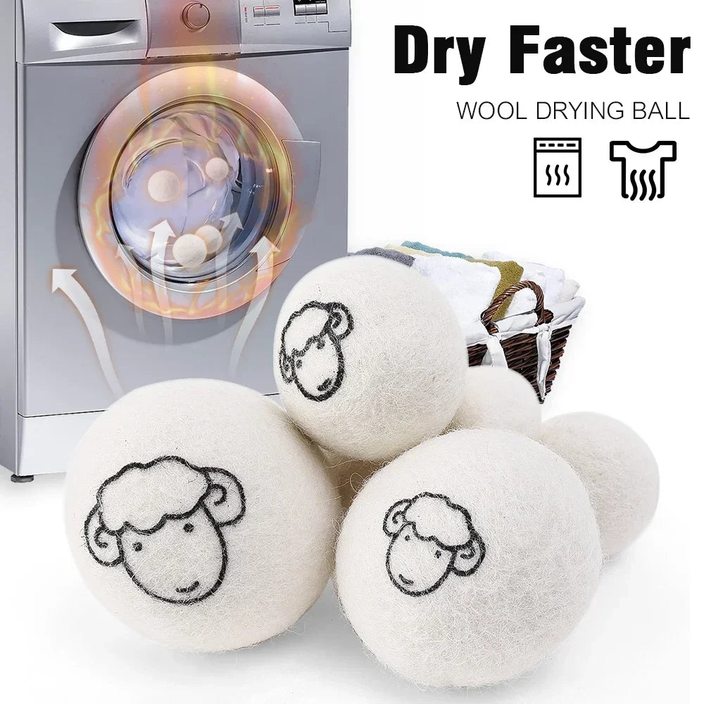 A set of six white wool drying balls next to a laundry machine, demonstrating how they make clothes dry faster.