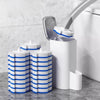 A reusable toilet cleaning brush kit with blue and white cylindrical brushes and a white holder next to a toilet.
