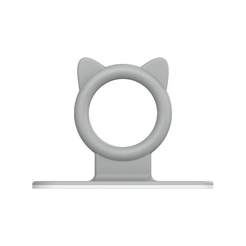 A silver silicone self-adhesive cabinet door handle lifter with a circular grip.