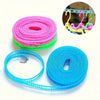 Three spools of heavy-duty anti-slip windproof clothesline in pink, green, and blue.
