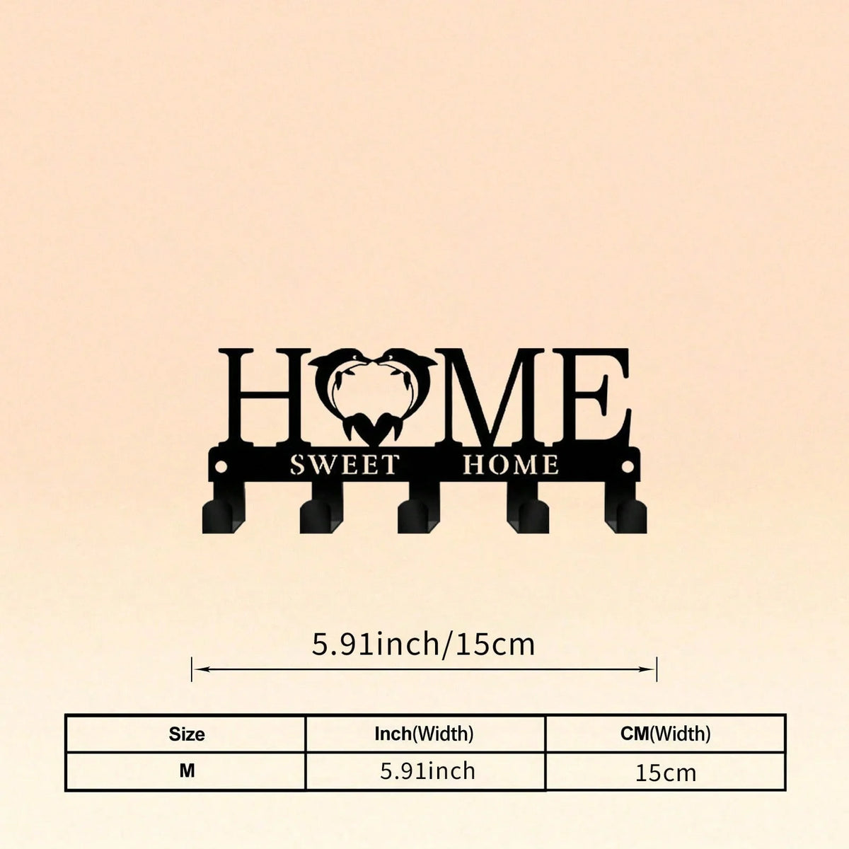 Black rustic metal wall hook key holder with the word HOME engraved on it
