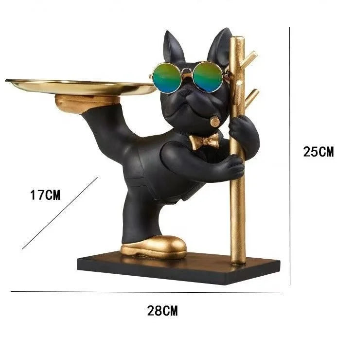 A black French bulldog sculpture wearing sunglasses, holding a coin bank and snack holder.