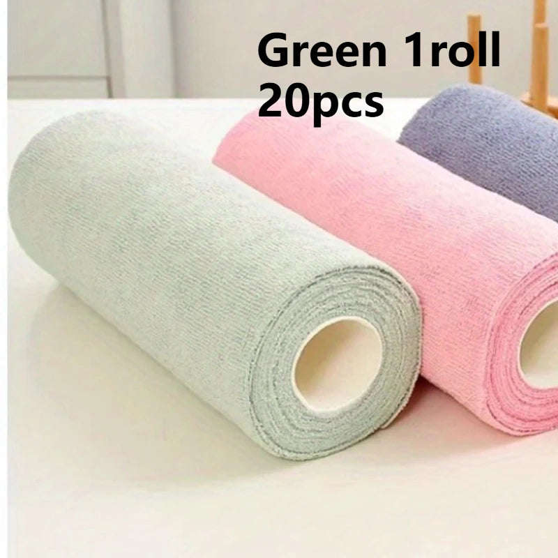 Green, pink, and purple microfiber cleaning rolls displayed on a white surface.
