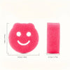 Pinke, strukturierte Schwamm in Smiley-Form zur temperaturwechselnden Reinigung.