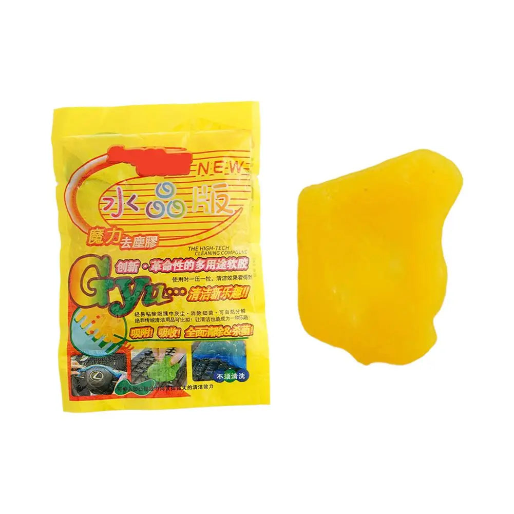 Yellow packaging for a universal dust and debris remover gel kit with Chinese text.