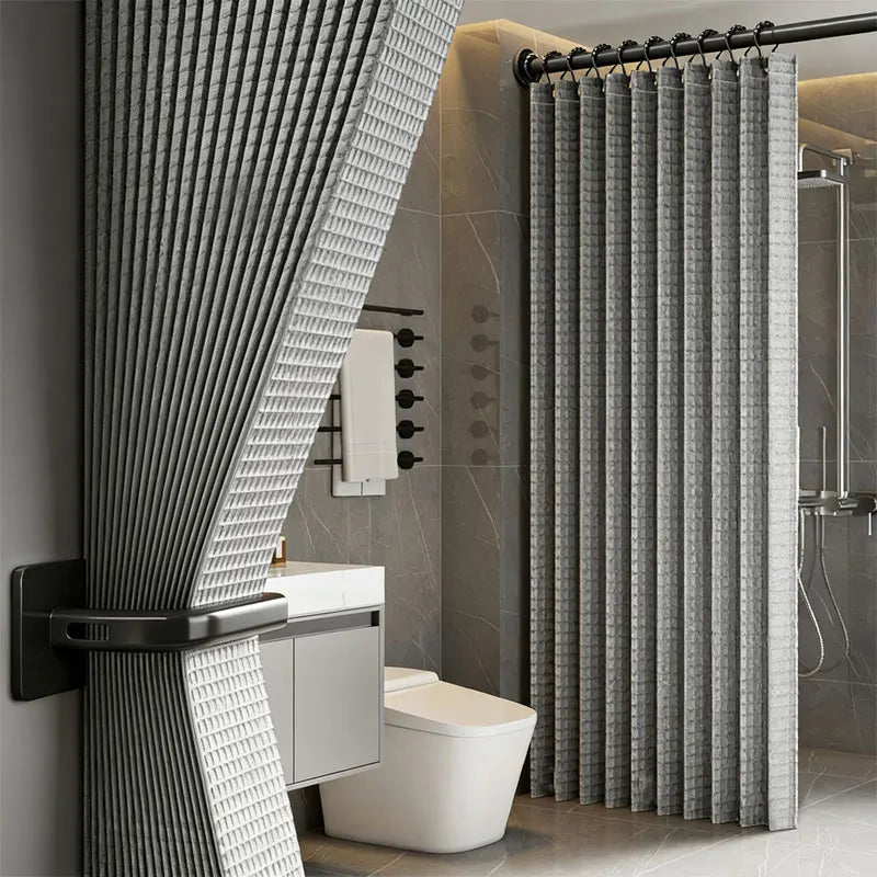 A modern bathroom featuring a magnetic shower curtain with a waffle texture and a vertical slat design.
