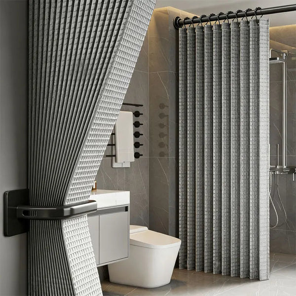 A modern bathroom featuring a magnetic shower curtain with a waffle texture and a vertical slat design.