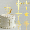 White cake decorated with gold acrylic cross and dove toppers